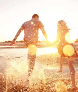 Happy couple embracing after successful relationship therapy with a relationship therapist near me