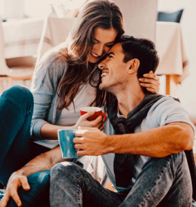 A couple engaged in healthy dialogue after transformative communication therapy sessions for a better, healthier relationship