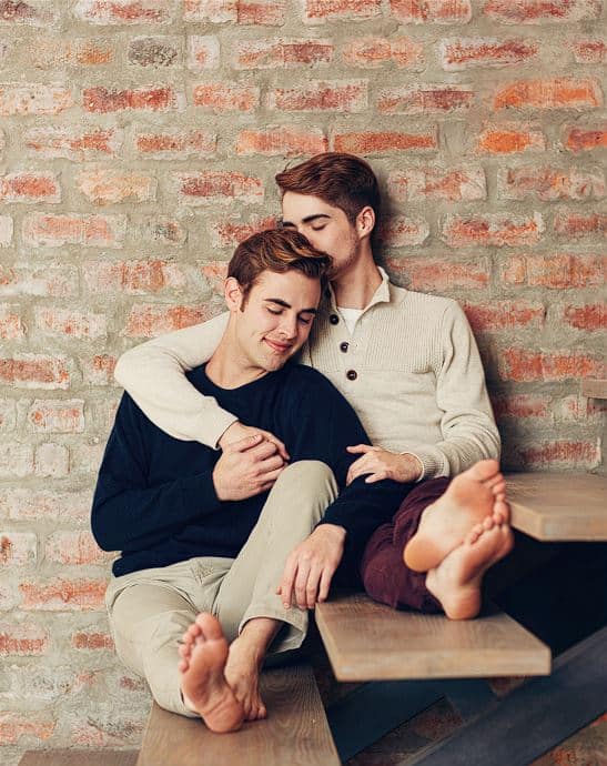 Couple hugging in the staircase