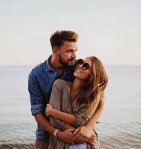 Couple embracing intimately, couples therapy in San Diego, CA; relationship counseling, marriage support; healing together