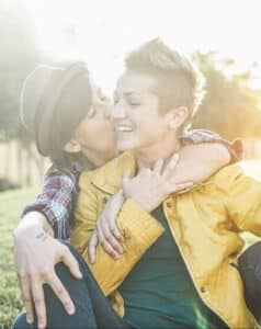 Newlywed couple kissing after successful marriage counseling sessions for a stronger, lasting relationship