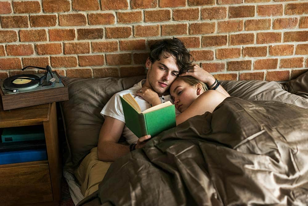 Caucasian Couple Spending Time Together in Bed