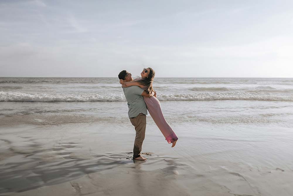 Man Carrying a Woman on the Beach