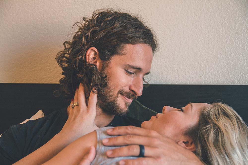 Man holding a woman. 