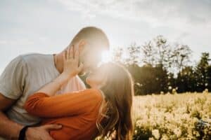 Newlywed couple kissing after successful marriage counseling sessions for a stronger, lasting relationship